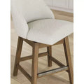 Sgabelli da bar girevoli imbottiti Cabalynn Counter Height, struttura marrone chiaro con seduta imbottita color avena